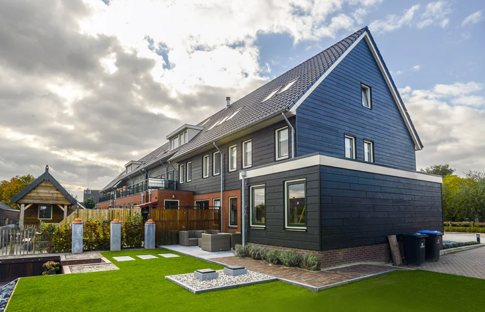 Achtergevels van de landelijke woningen Achtergevel landelijke rijwoningen