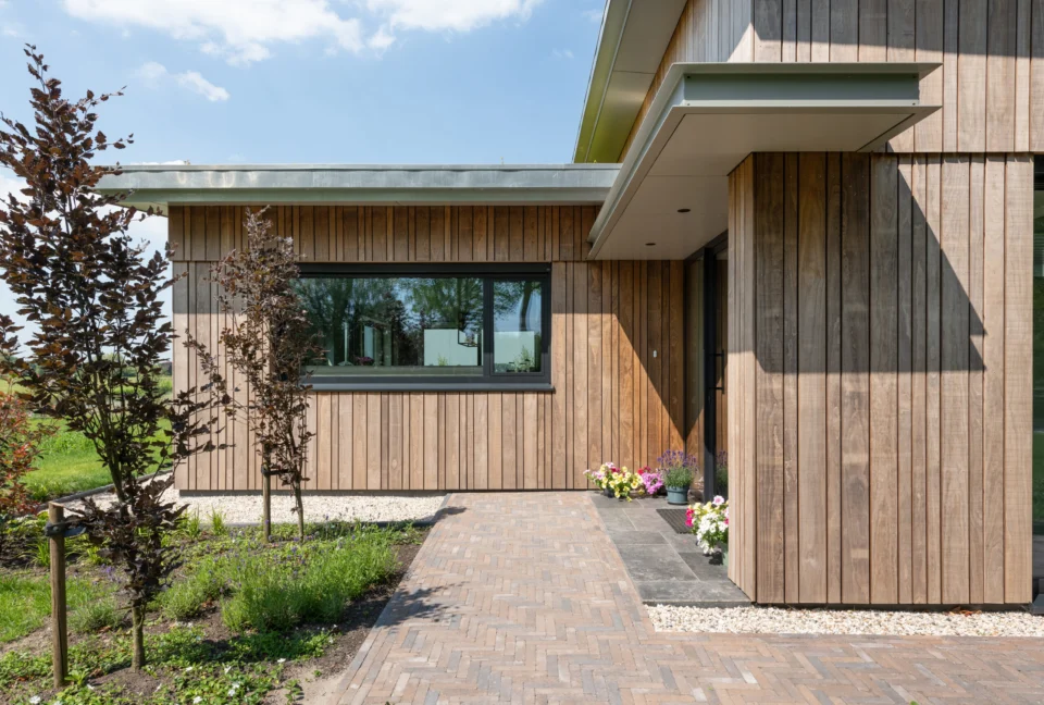 Entree van de woning in hout Entree van de woning in hout